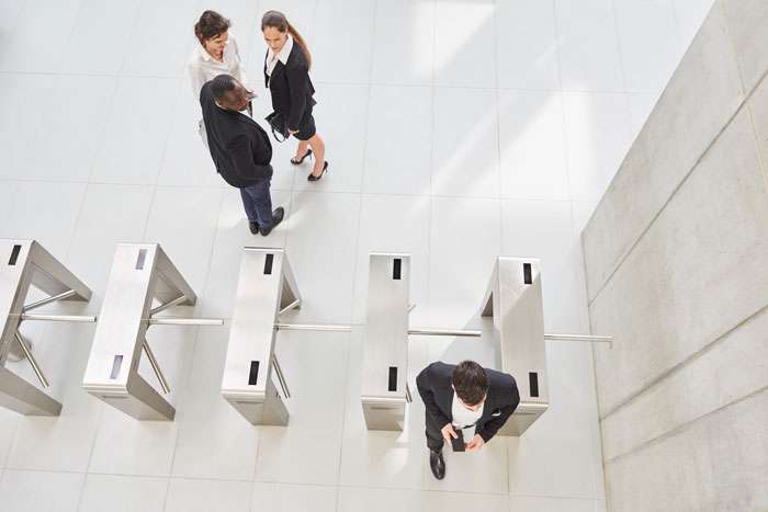 people entering office via control access